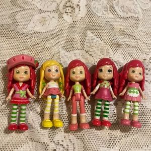 Lots of strawberry shortcake dolls.